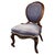 A magnificent Victorian spoon-back nursing chair of exceptional character, crafted from fine mahogany and showcasing the...