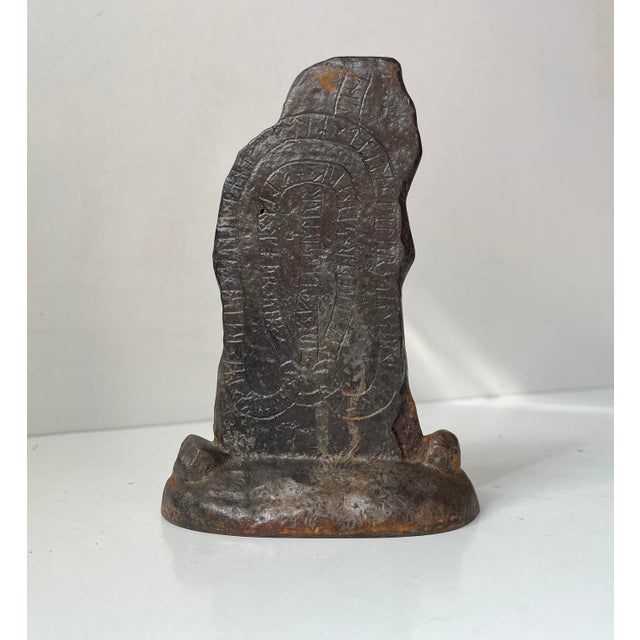 A cast model of a Danish Runestone from the Viking era. The so-called Klemensker Stenen on the Island of Bornholm found in...