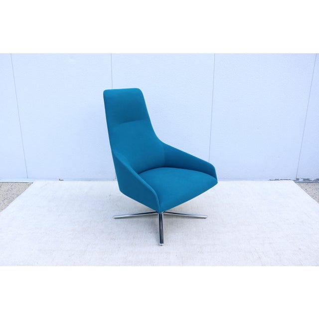 Fabulous Alya high-back swivel lounge chair, designed by Lievore Altherr Molina for Andreu World. Featuring a fully...