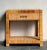 This individual nightstand, a testament to the enduring legacy of Bielecky Brothers’ American craftsmanship, combines...
