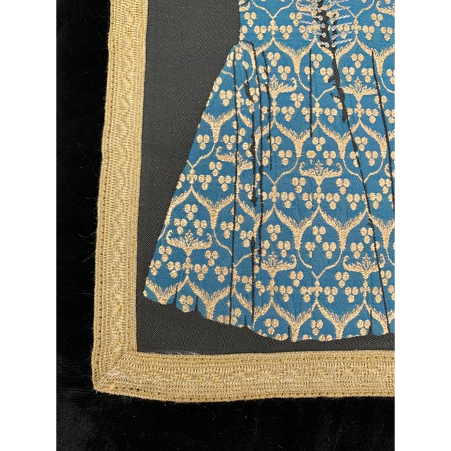 A beautiful vintage Ottoman Turkish black silk velvet pillow with a traditional Kaftan Appliqué in a blue, gold and silver...