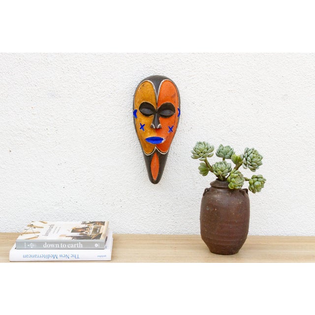 This captivating Songe mask from the Democratic Republic of Congo is a powerful example of African tribal art. The mask is...