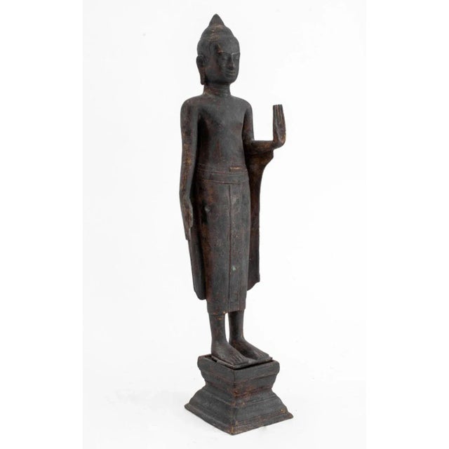 Southeast Asian Standing Buddha Bronze Sculpture, hands in the abhayamudra gesture, with bronze square base. 21.5" H x 5"...