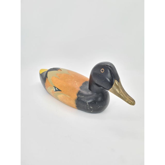 Decorative duck figurine made of wood, hand-painted, dated to the 1960s/1970s. A model with a classic, elongated form...