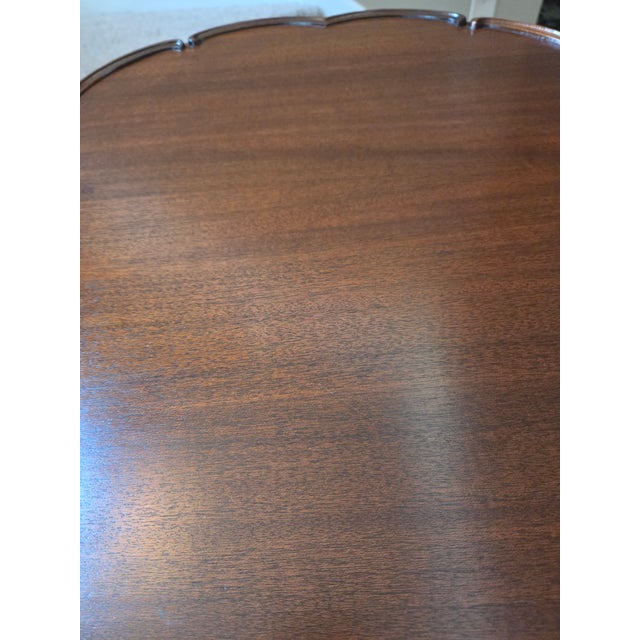 Mid 20th Century Pie Crust Tilt Top Table With Turned Tripod Base Brass Claw Feet For Sale In Indianapolis - Image 6 of 13