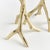 Made from handsculpted molds and in solid cast aluminum, these tall and slender taper holders in warmGold are a...