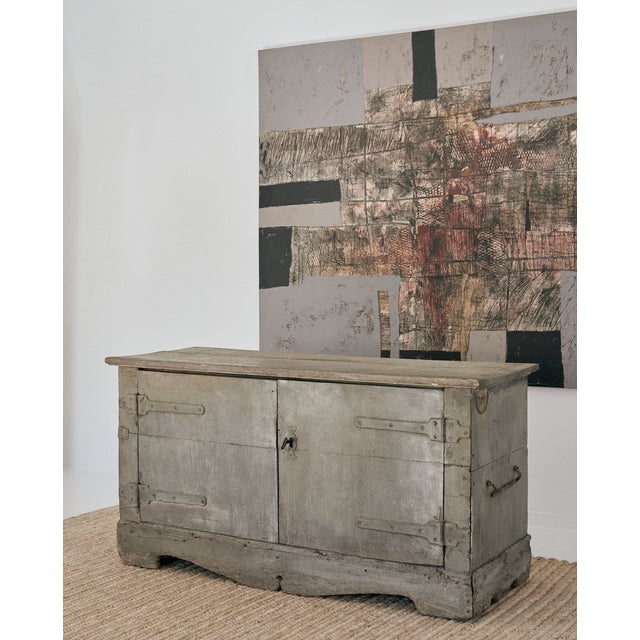 Large, vintage French antique grey painted two-door chest. Rustic old-world charm best describes this cabinet, and it...