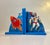 A set of Scandinavian Bookends in lacquered wood. The space theme is perfect for any little aspiring pilots room. The...