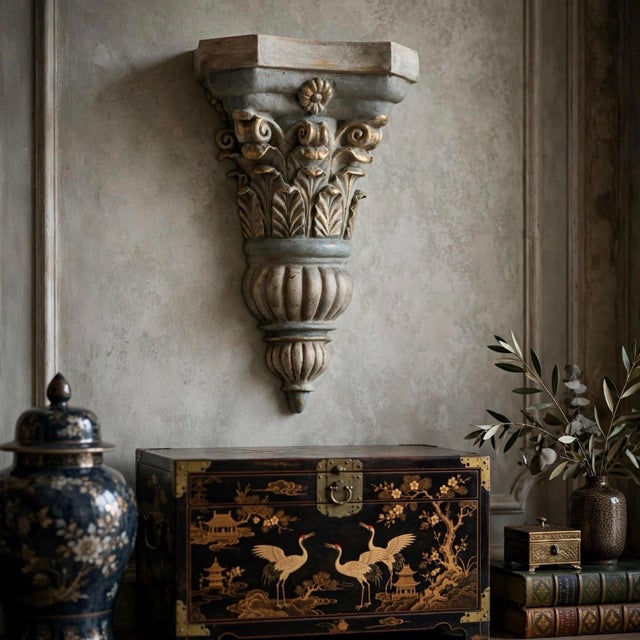 This monumental Neoclassical Corinthian wall bracket by Turtle & Crane Atelier has been hand-finished in a chalky,...