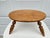 This classic milking stool is supported by turned legs pegged directly into the thick oval seat. The underside edge of the...