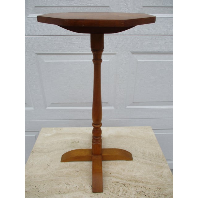 A classic maple octagonal lamp, plant or candle stand on pedestal. This piece is labeled as a Cohasset Colonials Original...