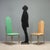 Chairs produced by Sabot for Maison Jansen in the 1970s and designed by Alain Delon, featuring a polished brass frame that...