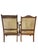 An elegant set of two antique American Empire walnut armchairs dating to approximately the mid-19th century. These...