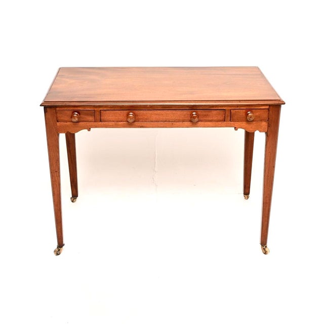 A wonderful and quite unusual antique Georgian period writing / games table. This was made in England, it dates from...