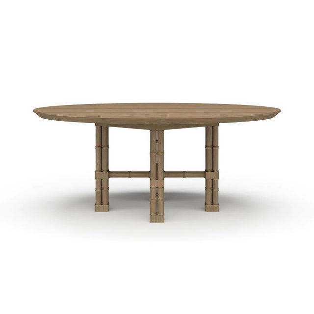 Hand-carved from mahogany and shown in our natural sandbar finish, this statement table features faux bamboo legs in the...