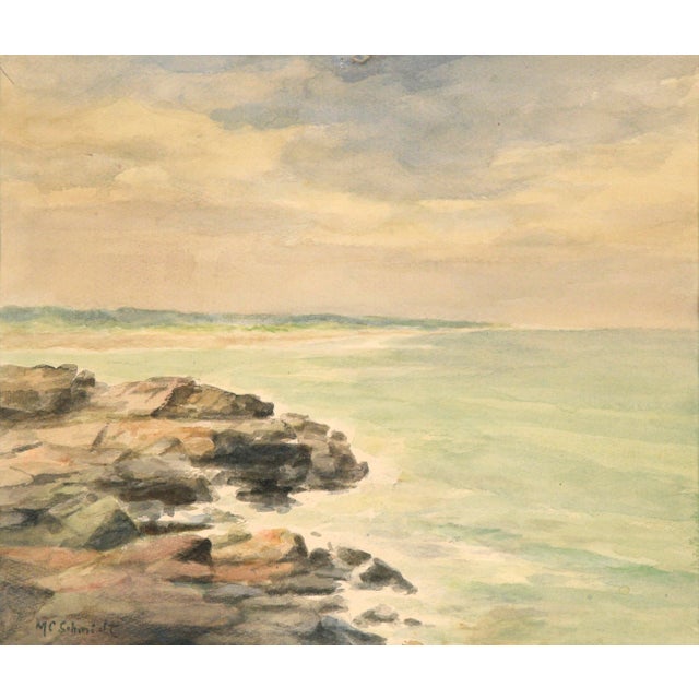 Serene mid century watercolor seascape signed by unknown artist M. C. Schmidt. Signed in the lower left corner. Presented...