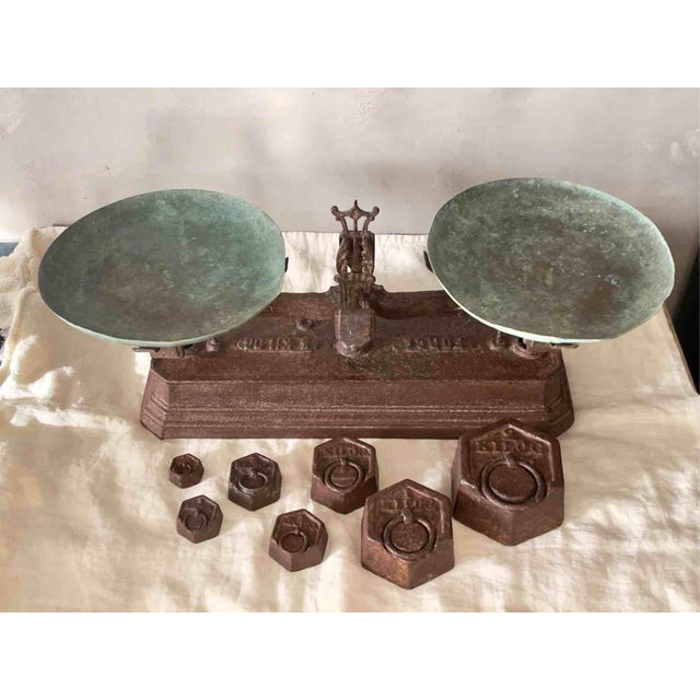 A magnificent collector's item for high-end interior decoration, comprising a French two-pan commercial scale with the...