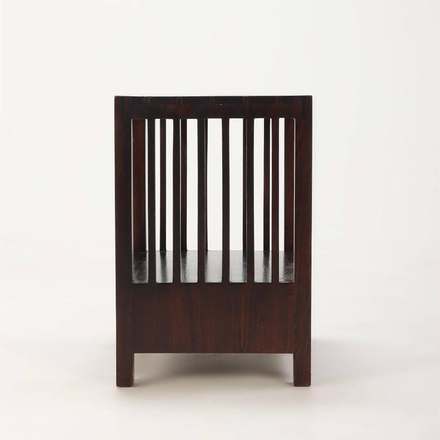 A well-crafted pair of bedside tables in the Arts and Crafts style, each constructed in stained oak with vertical slatted...