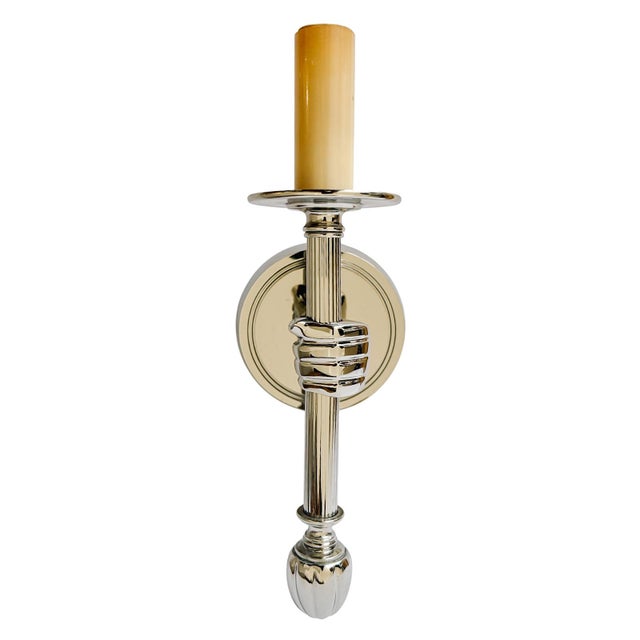 A sophisticated pair of electrical wall sconces, produced by Top Brass in 1992, in the style of the iconic mid-century...