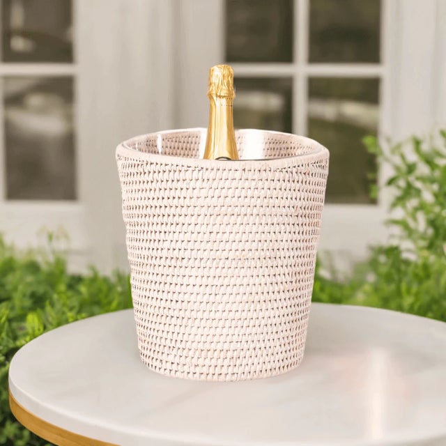 Our artisan-crafted Rattan Champagne Bucket will add texture and elegance to your celebrations. This stunning piece...