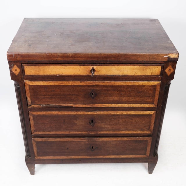 Louis seize chest of drawers of mahogany with inlaid wood. The chest is in great antique condition.