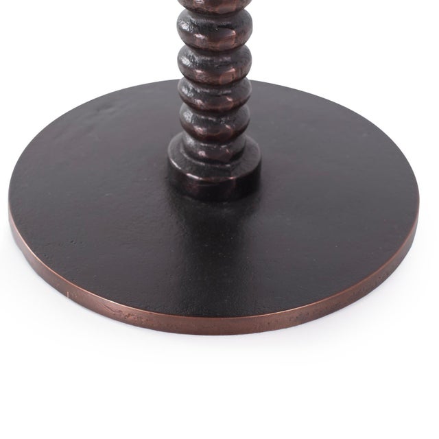 The Brancusi Antique Bronze Drinks Table The round top and base offer a classic touch, while the standout feature is the...