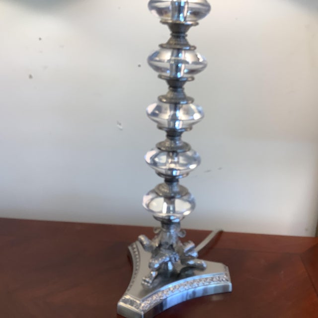 Lovely pair of crystal ball and white metal lamps neoclassical style.. Shades measure 15” d by 10.50 “ high