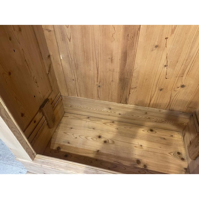 This charming antique wardrobe, designed for disassembly, has been completely sanded inside and out. The wardrobe is not...