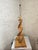 Mid-Century Modern twisted spiral lamp. This sculptural lamp has a helix-shaped wooden base, crafted from alternating...