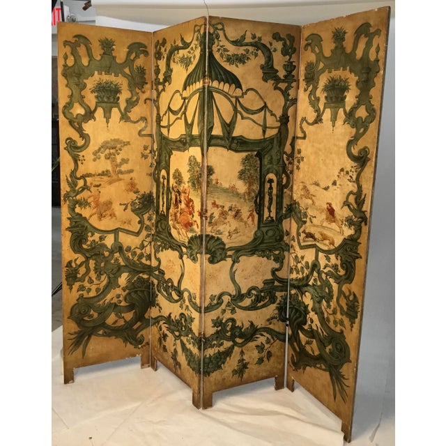 Amazing continental four-panel folding screen hand painted in Baroque style with elaborate scrolls and hunting senes .