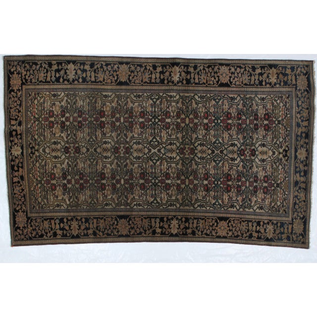This masterpiece is a wool pile genuine handwoven exceptionally fine antique Persian Ferahan in excellent condition. The...