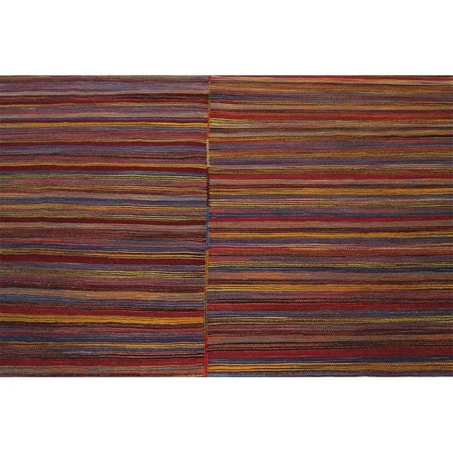 ACTUAL SIZE: 6’3″ x 6’9″ PRIMARY COLOR: Rust / Blue AGE: New MATERIALS: Wool FOUNDATION: Cotton PRODUCTION: Handwoven,...