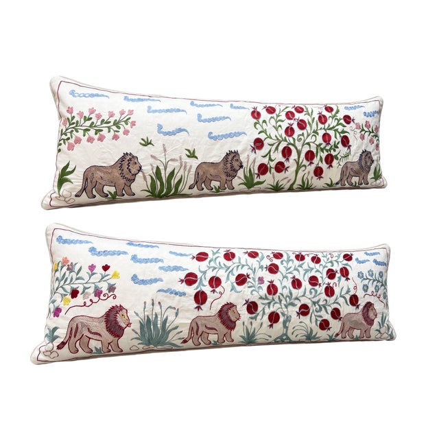 This beautiful 18'' x 54'' hand-embroidered Suzani pillow cover set was made from authentic Uzbek cotton fabric. The...
