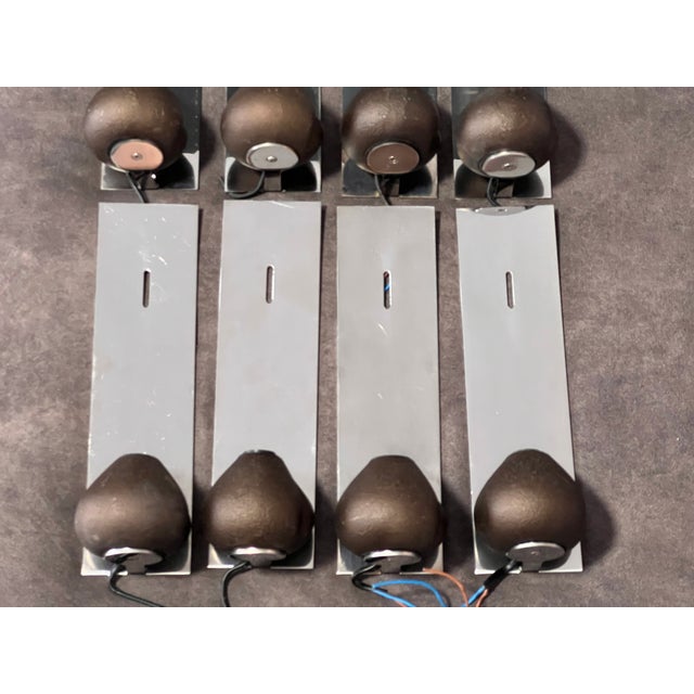 Steel wall supports model a9.503.82 with height measurements 29 cm. Depth 9.5 cm. Width 7.8 cm., bases a2.503.02, sold...