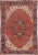 Antique Heriz Rug With Stylized Central Medallion Set on Tomato Red Field For Sale