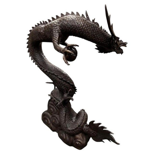 An impressive large-scale bronze Chinese dragon sculpture, conceived as a decorative water feature and exceptionally...