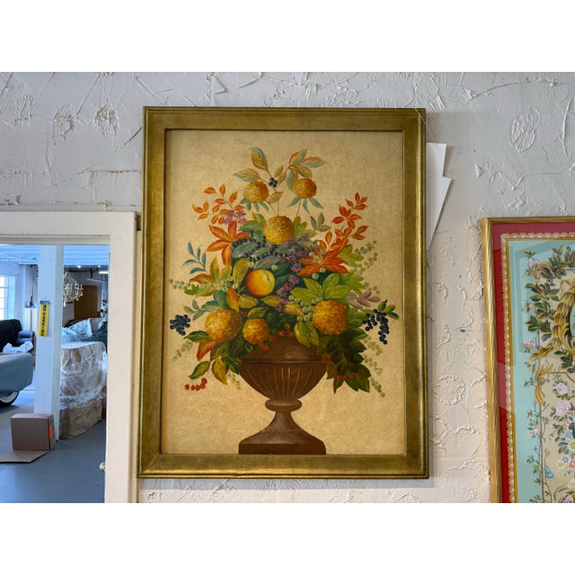 Large still life painting featuring an overflowing classical urn filled with lush blooms, fruit, and berries in rich...