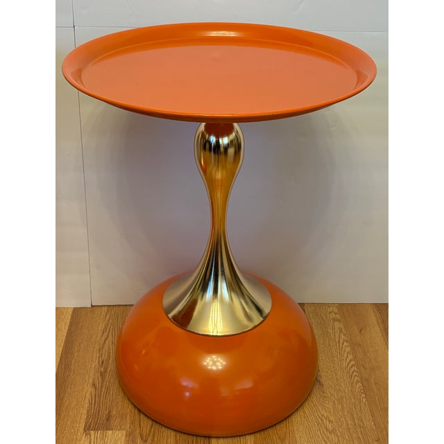 These tables are in a Space Age Pop style, which mimics the futuristic design trends of the late 1960's and 1970's. It...