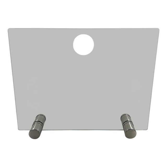 Design/One glass and chrome fireplace screen with brass legs. For Sale