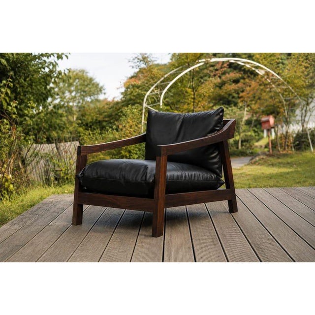 A statement piece that blends comfort with timeless design. This olive green leather lounge chair is crafted for those who...