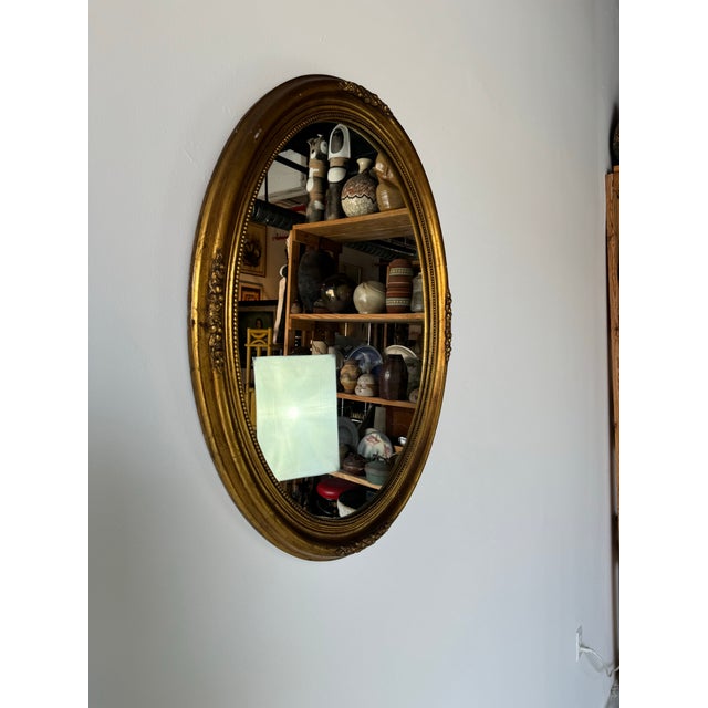 We are privileged to be offering for sale this fantastic Vintage Hollywood Regency gold wood oval wall mirror. C,1960's....