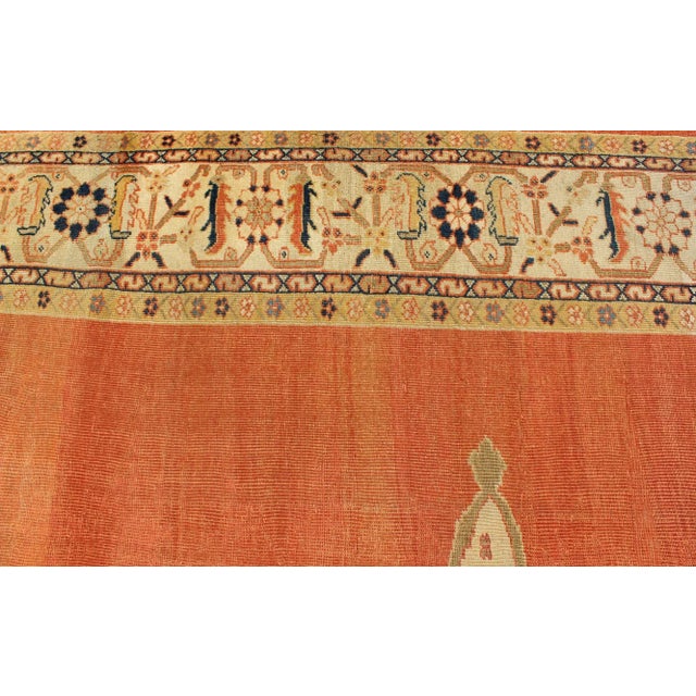 Pumpkin Antique Ziegler Sultanabad Rug in Soft Orange Background, Ivory and Pops of Navy Blue For Sale - Image 8 of 10