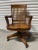 English Industrial Oak "Captain Chair" or Swivel Chair, Circa 1900's. Chair made by Milwaukee Chair Co.. Seat height is...