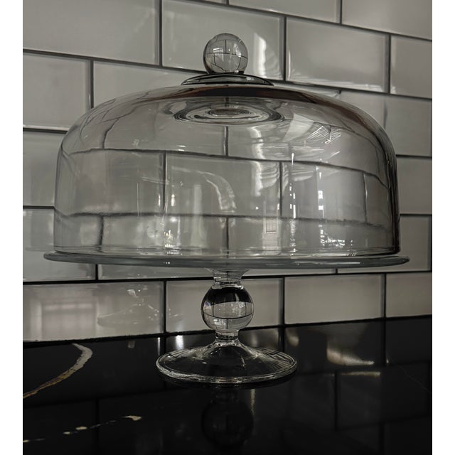Elegant 1970s hand-blown glass cloche cake stand on pedestal, featuring a beautifully proportioned free-set dome (without...