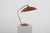Walnut, vinyl, and brass desk lamp, Temde Leuchten edition, modernist style, 1950s. This lamp has been meticulously...
