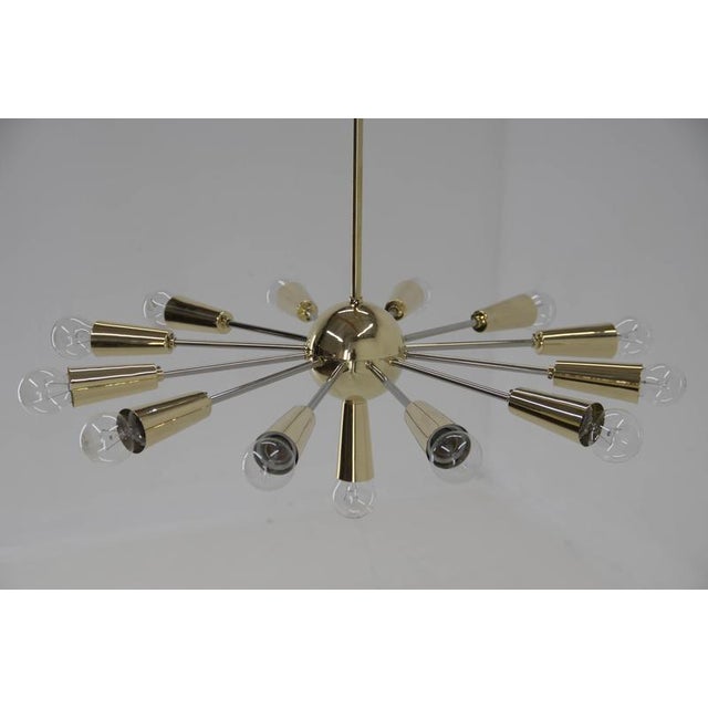 Rare Mid-Century big Sputnik style chandelier. Made in Czechoslovakia in 1960s. Cleaned, polished, rewired: 13x40W,...