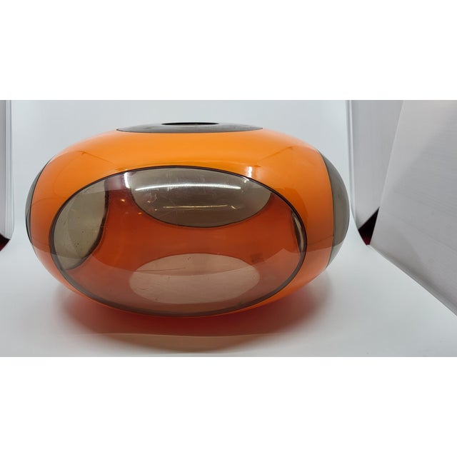 This iconic Space Age chandelier is a centerpiece for any modern interior. With its bright orange color and futuristic...