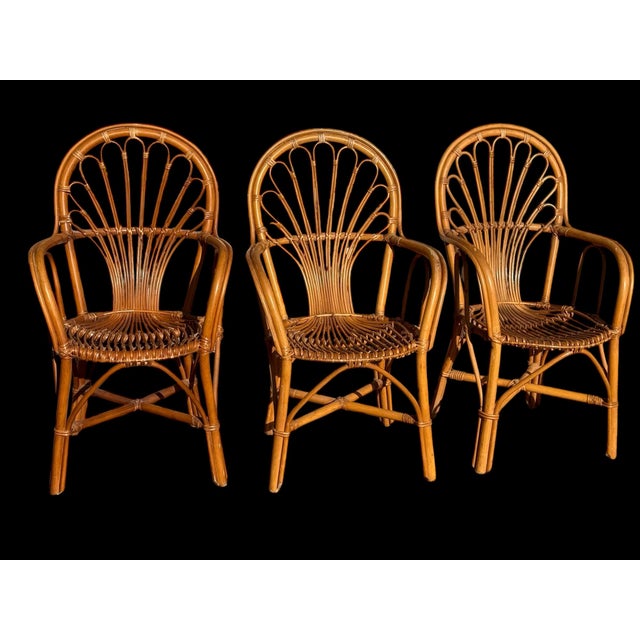 Set of 3 rattan armchairs from the 1980s in very good condition. French work from the south of France.