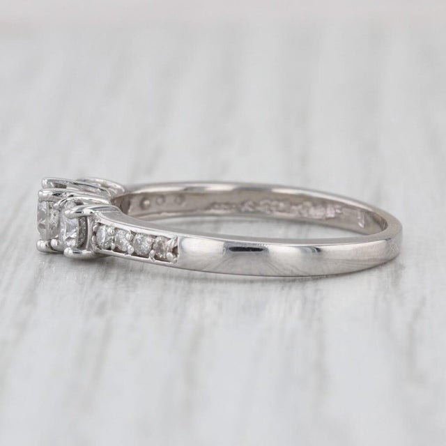 Gemstone Information: - Natural Diamonds - Total Carats - 0.81ctw (center 0.33ct, Sides 0.38ctw, Accents 0.10ctw) Cut -...