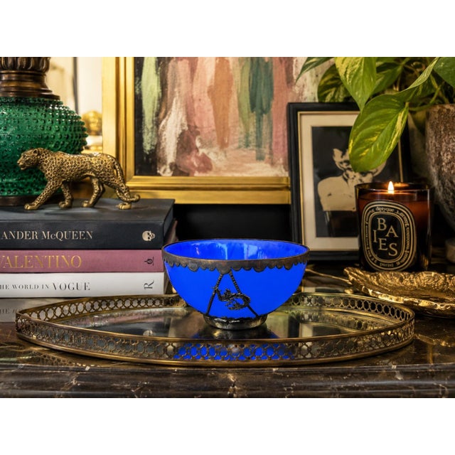 A striking antique Chinese Peking glass decorative bowl featuring an intensely vivid cobalt blue body housed within an...